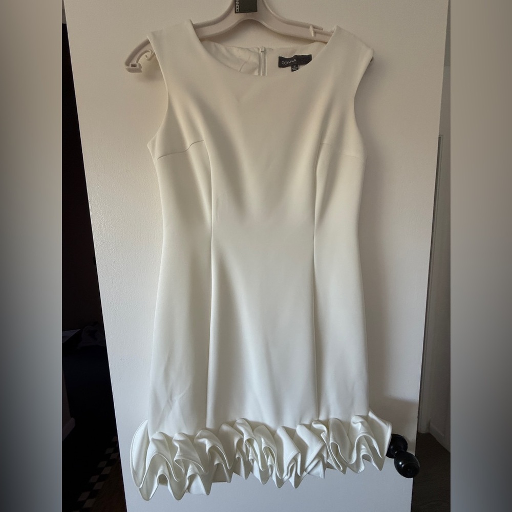 Donna Ricco size 12 White Dress w Ruffle bottom. Never worn NWT